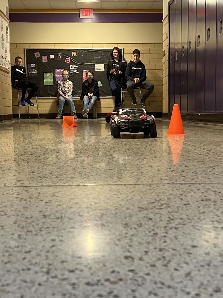 STEAM Club participants with an RC Vehicle